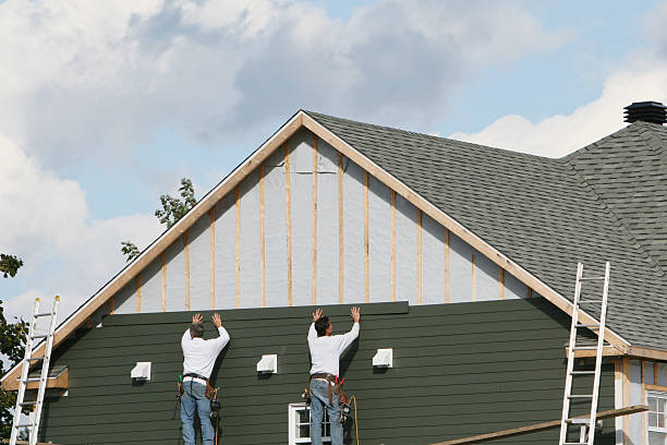 Professional Emergency Siding Repair technician working in Freedom, PA